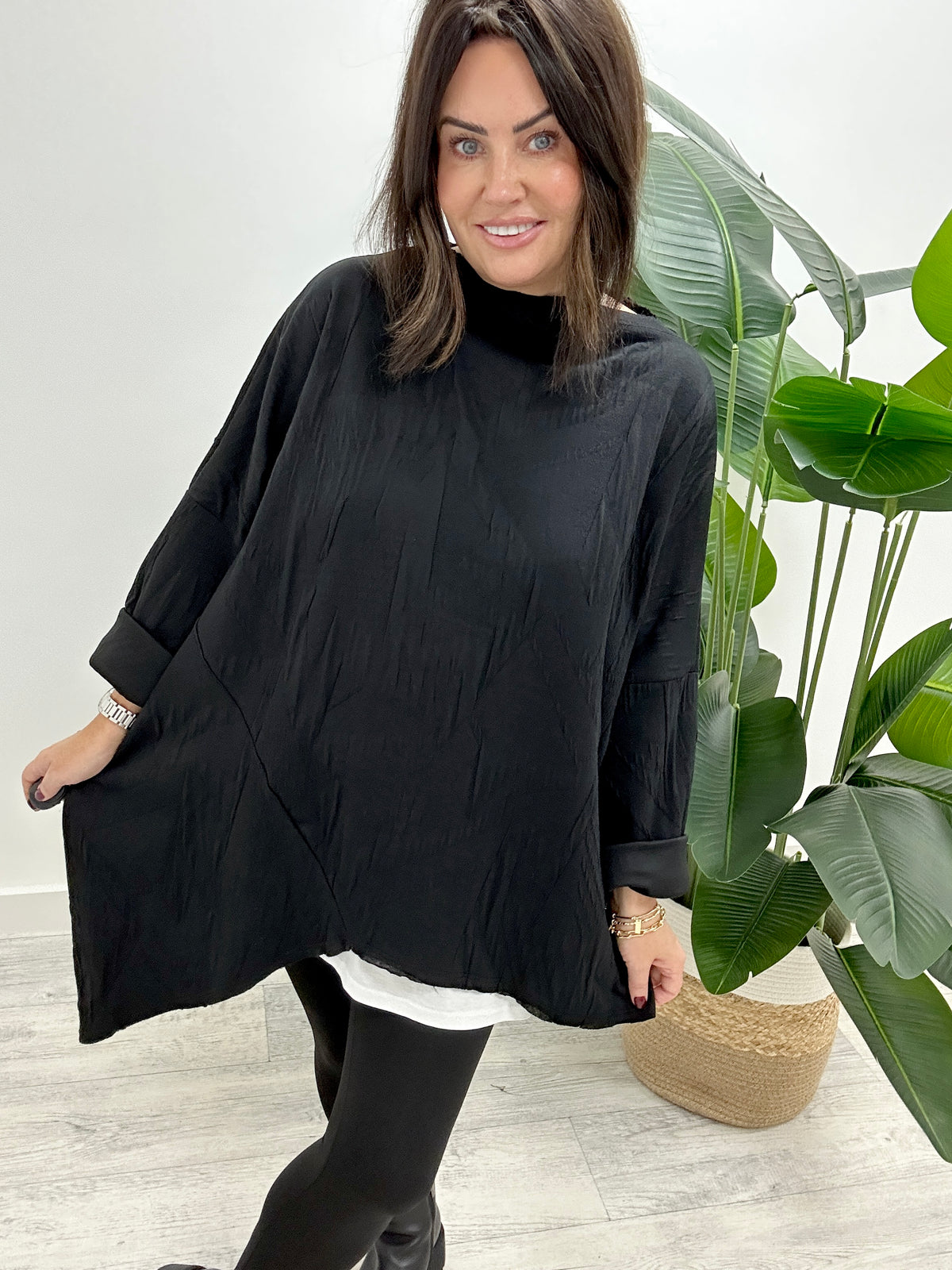 The Cosmo Asymmetric Tunic